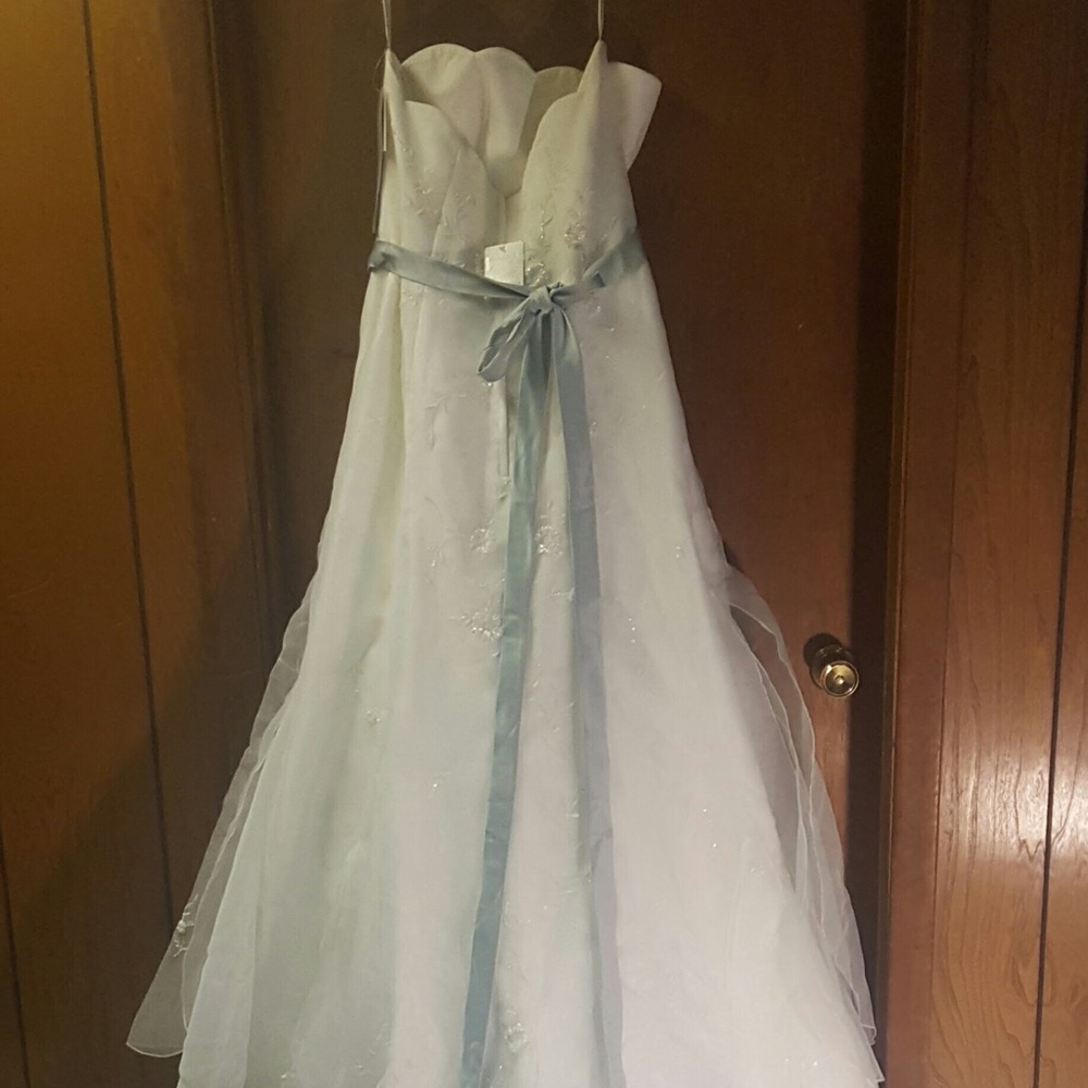 Wedding dress by Monique Lou